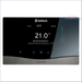 Weißes Wandheizeinheit mit Vaillant sensoCOMFORT Thermostat für effiziente Heizungsregelung